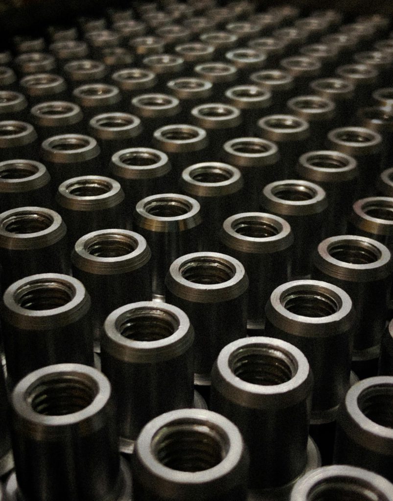 Batch of machined steel flanges