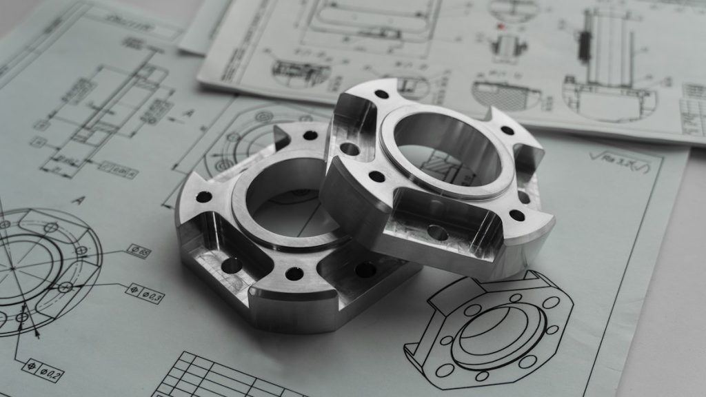 Machined parts on an engineering drawing